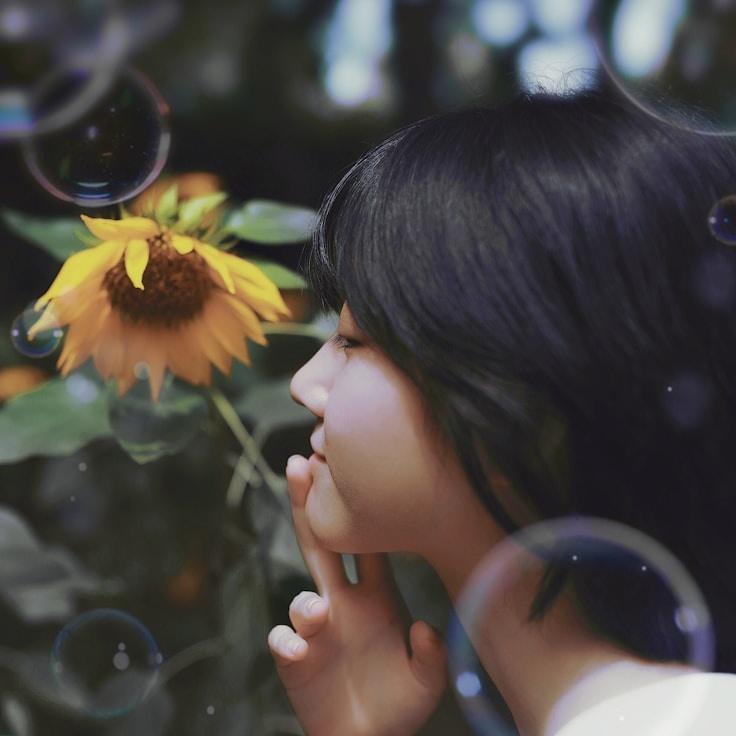 Kaveri Mehta, Lead Design Curator at Lounge Garden River, reviewing corporate floral arrangements